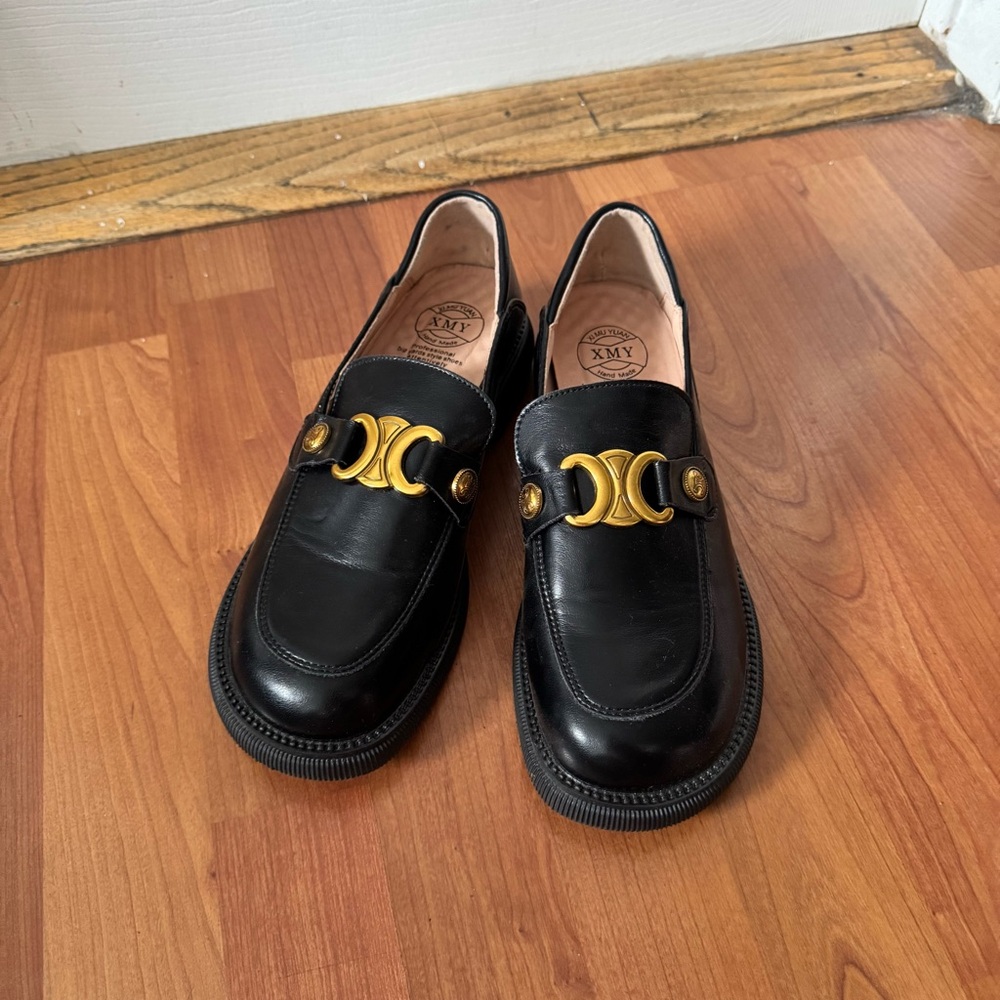 Stylish Black Leather Loafers with Gold Accent